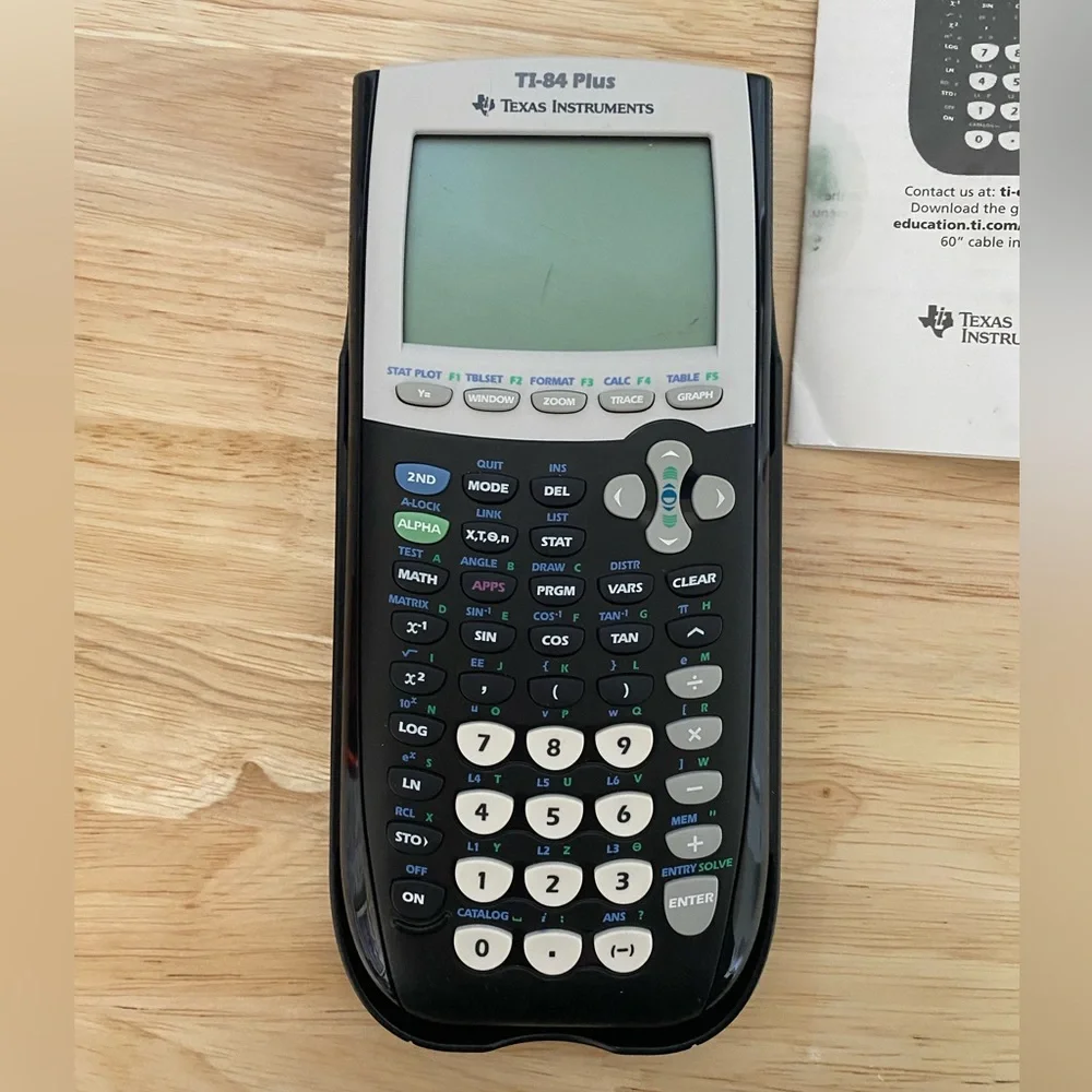 Texas Instruments Black TI-84 Plus with USB Cable and Manual - Picture 2 of 4